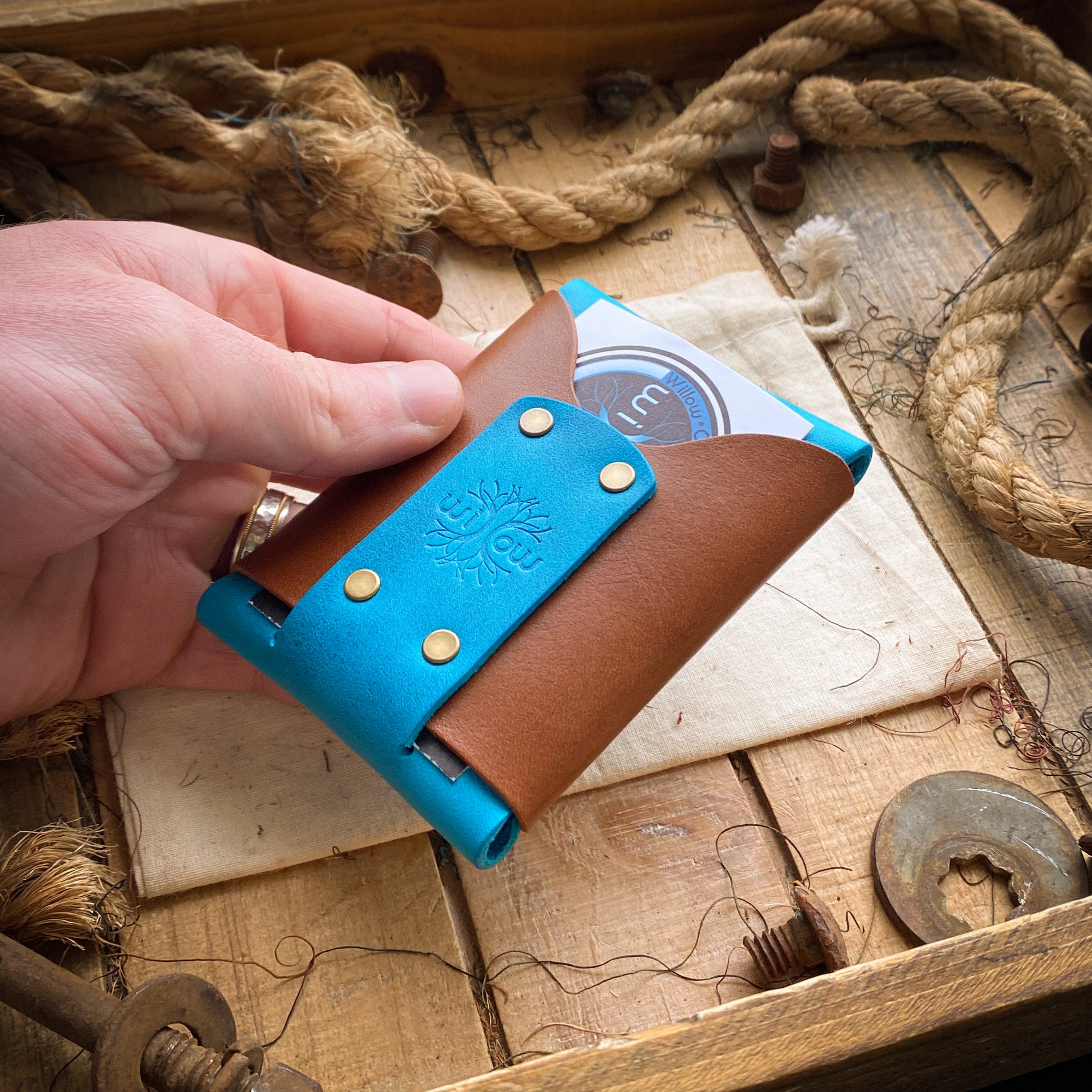 Wask Minimalist Wallet in Blue Raspberry and Bourbon In Hand